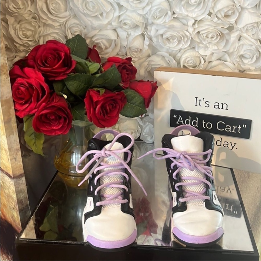 Stylish Nike Black and White Sneakers with Purple Accents
